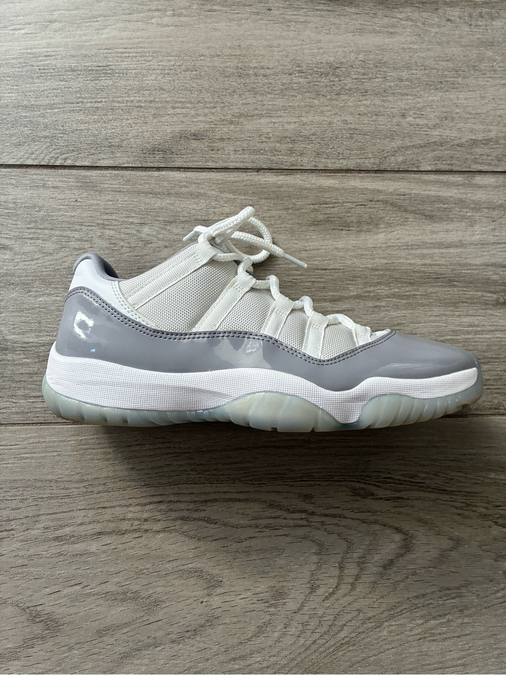 Air Jordan 11 Low “Cement Grey” – Men’s Size 9.5